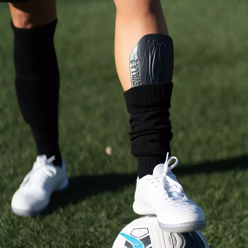 Aptiqe - Parastinchi da Calcio Personalizzabili